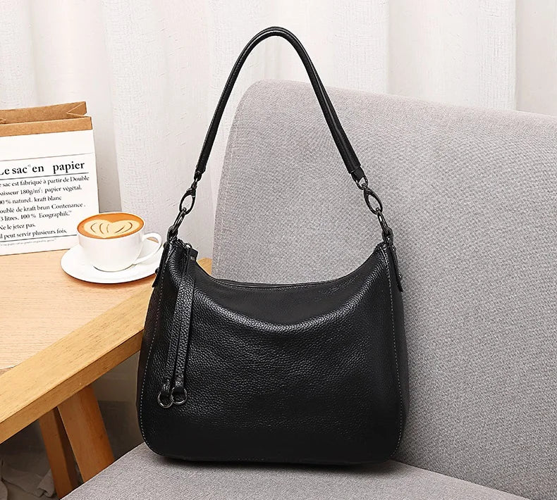 Bolsa de Ombro Feminina de Couro Genuíno 2025 Bolsa de Mão de Couro de Vaca de Alta Qualidade Bolsa Versátil Bolsa Transversal Casual Diária Como Presente